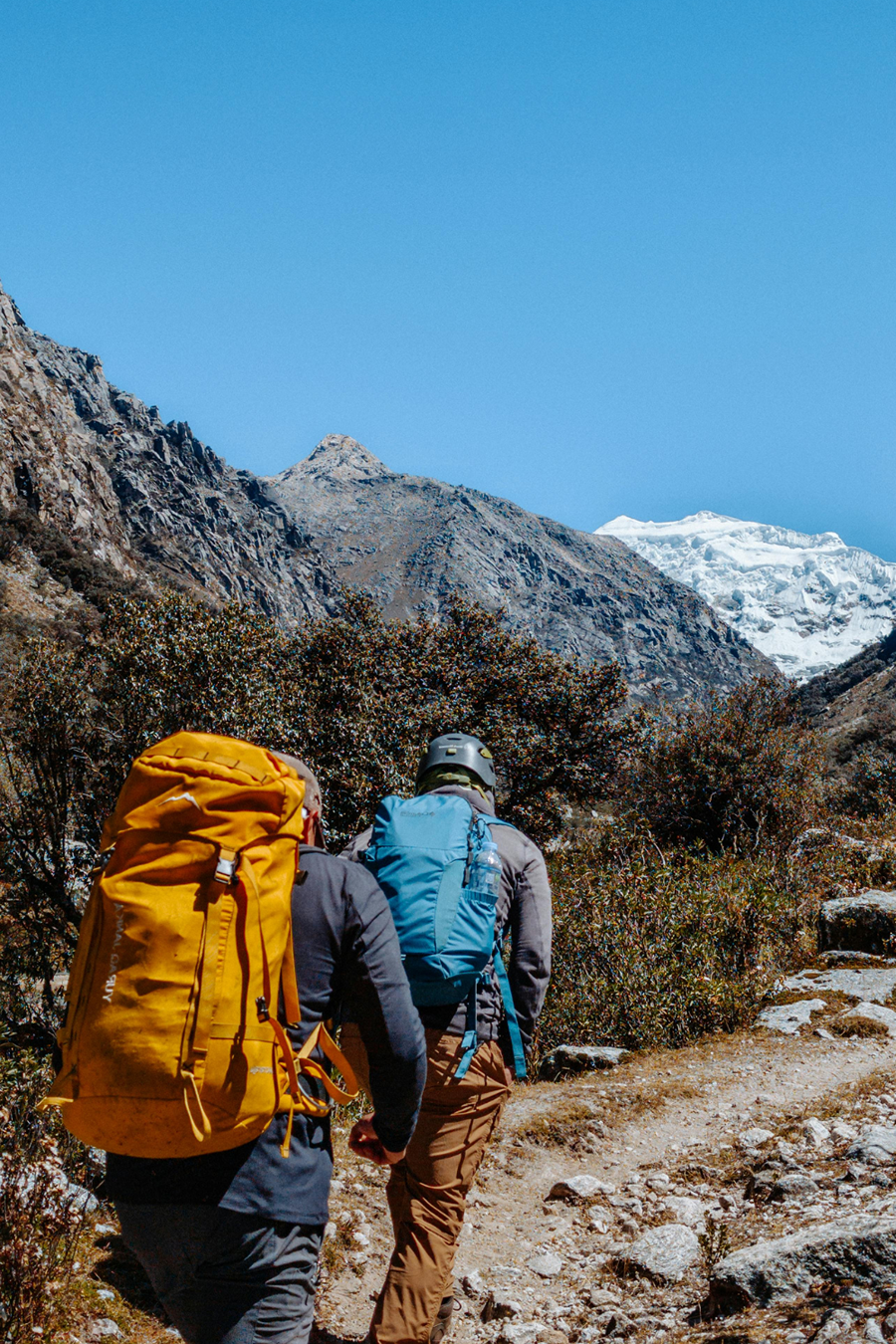 two backpackers hiking