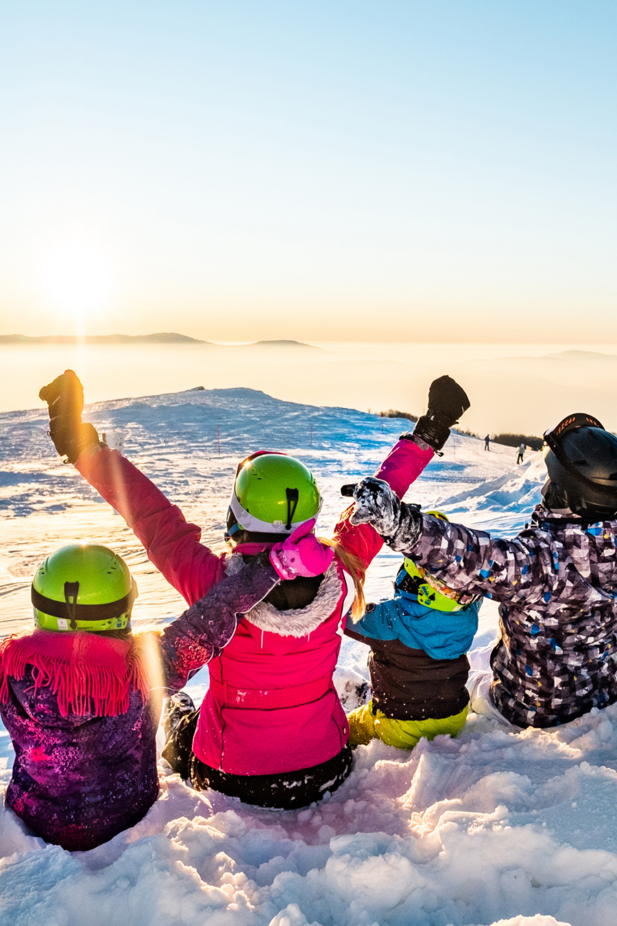 family on ski slopes