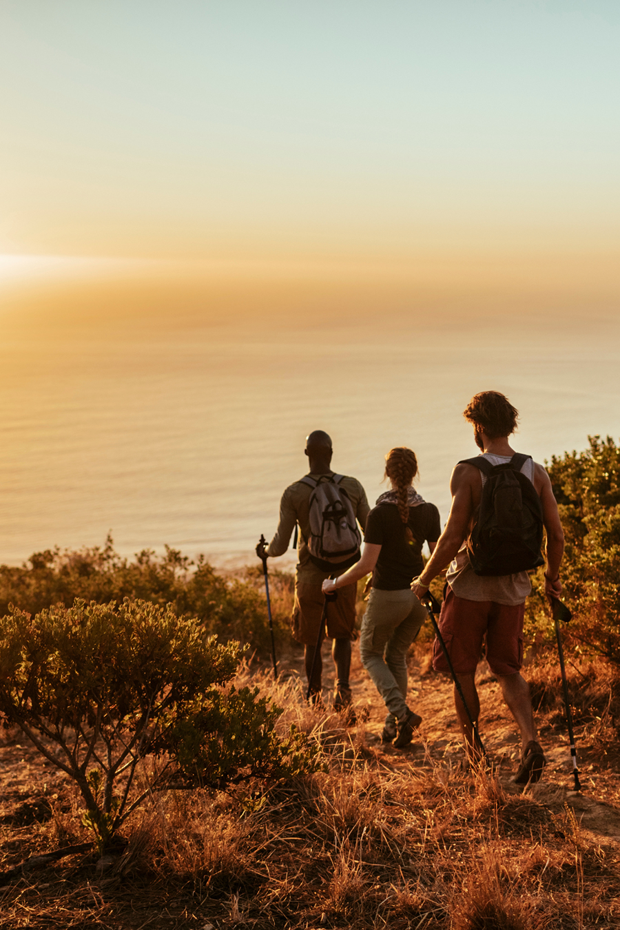 three people hiking